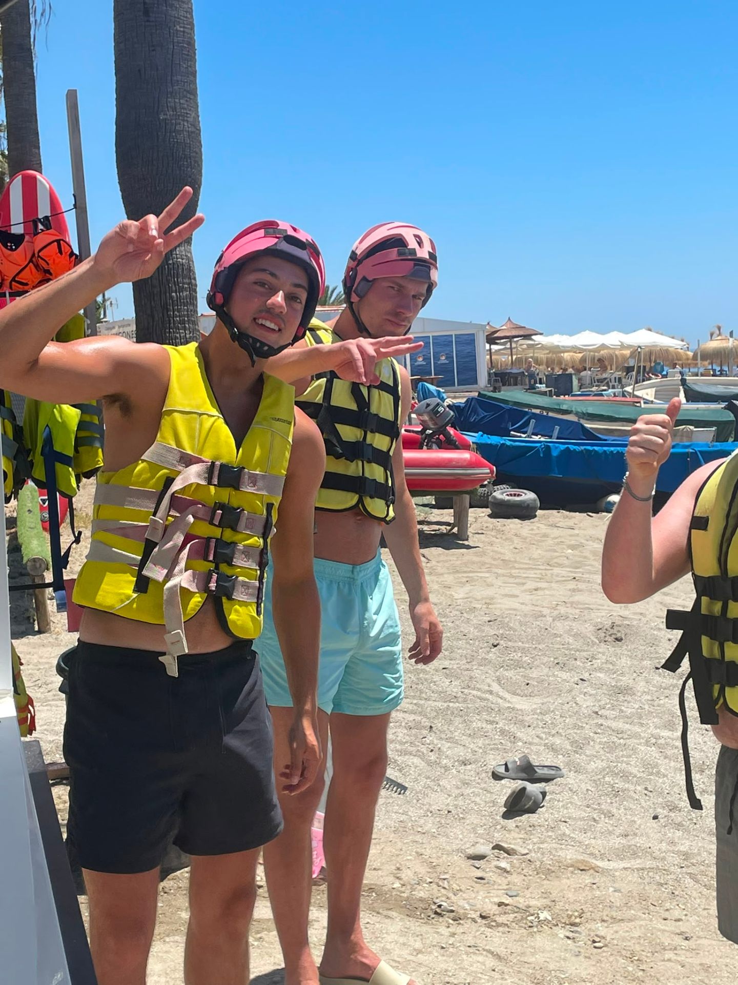 Friends in pink helmets and yellow vests ready for the octopus ride
